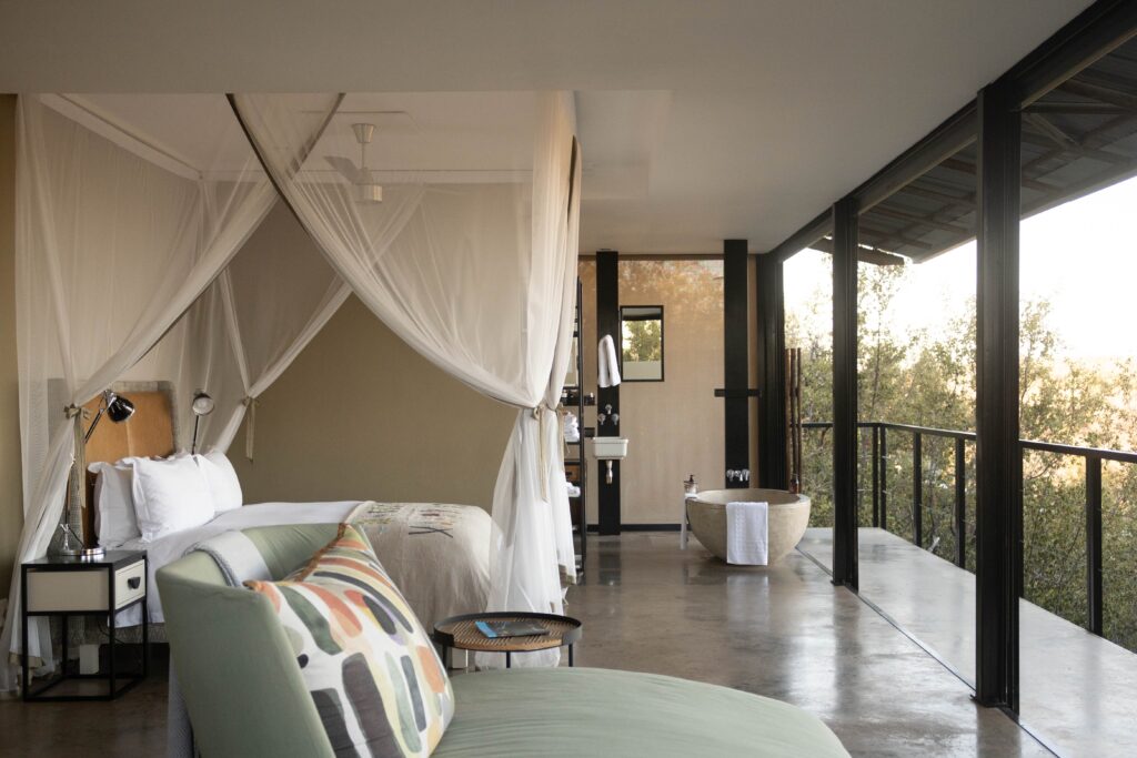 Luxury African safari lodge offering stunning views over the African wilderness, with premium accommodations and personalized services