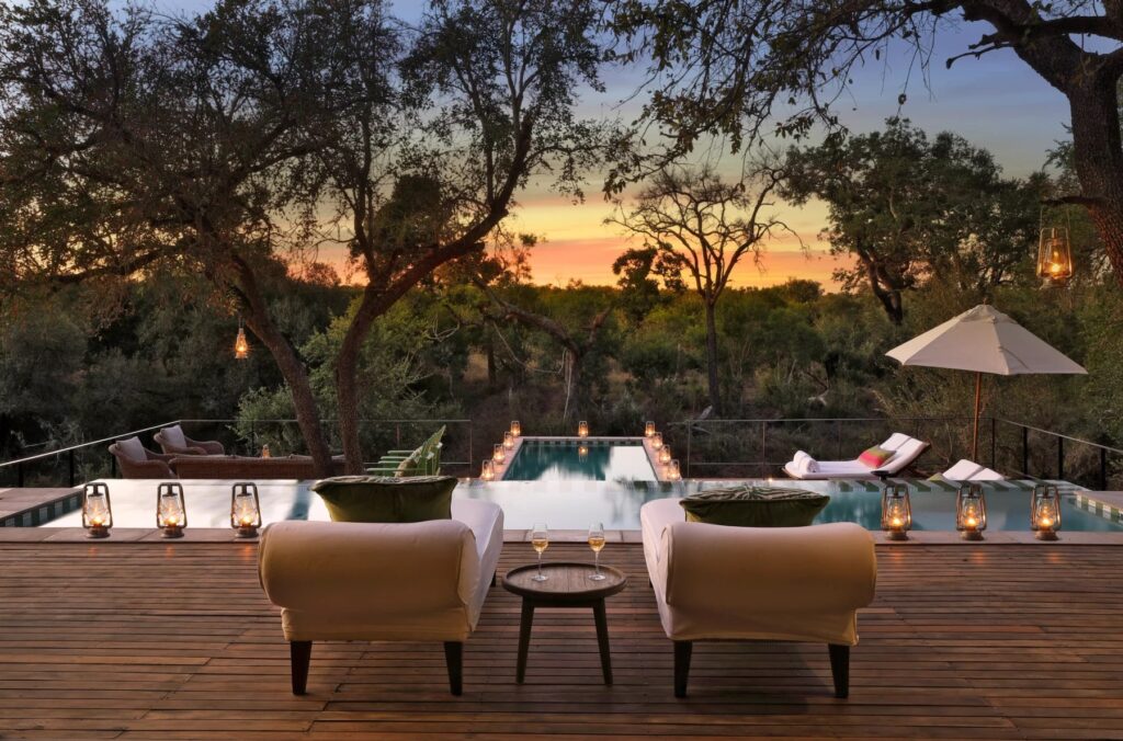 Sweeping panorama of the African savanna with Royal Male Wane in the foreground during sunset.