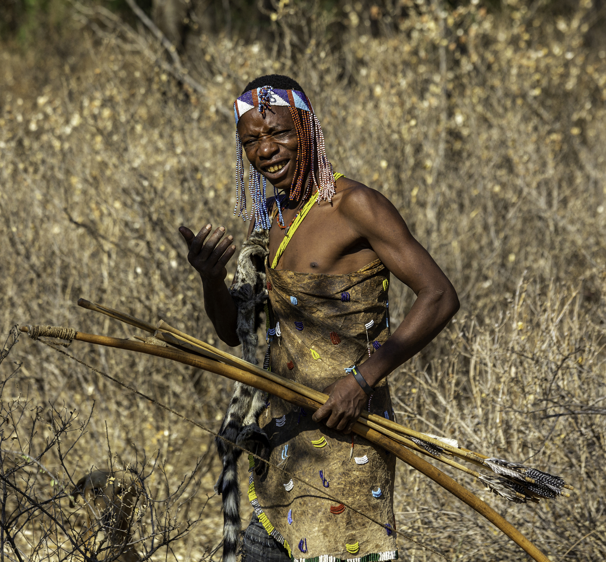 Hadzabe hunter with bow and arrows in the bush near Lake Eyasi, Tanzania
