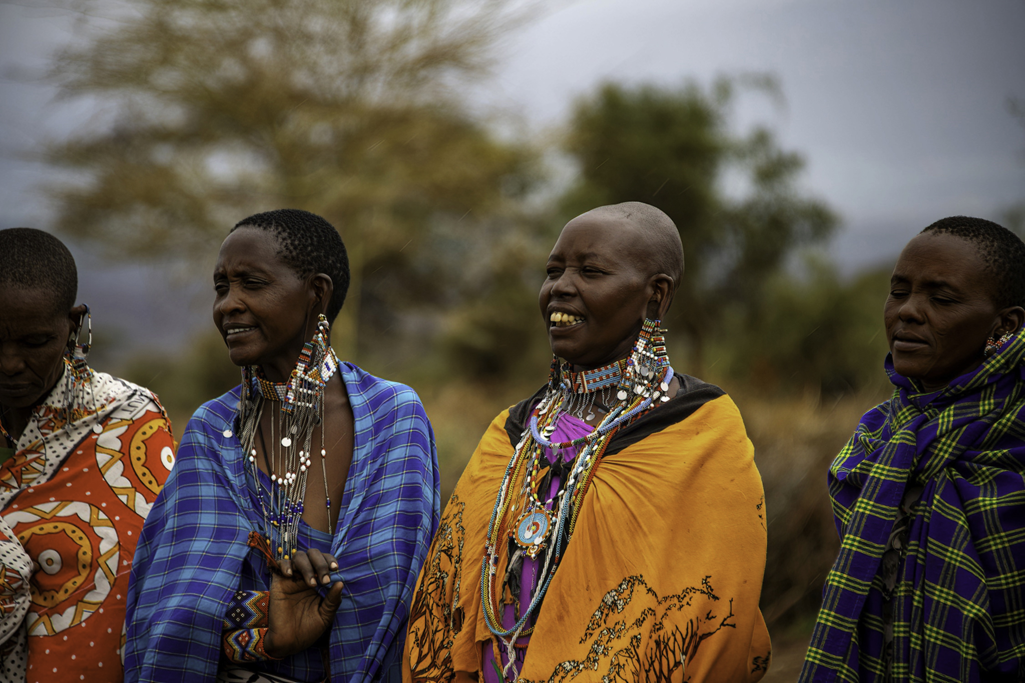 Maasai women in bright shukas and beaded jewellery near Ngorongoro, Tanzania